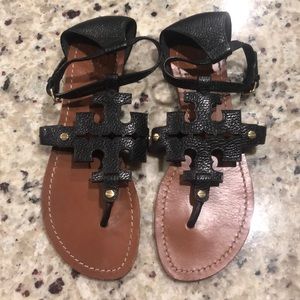 Tory Burch black leather sandals.